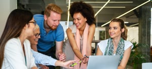 smiling-diverse-colleagues-gather-in-boardroom-bra-2023-11-27-04-57-19-utc-1